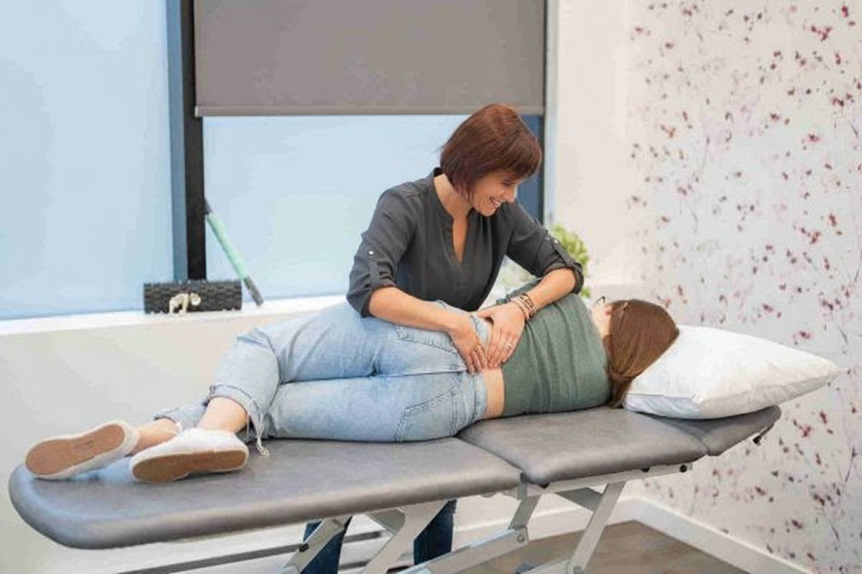 Jessica Cameron performing physiotherapy treatment